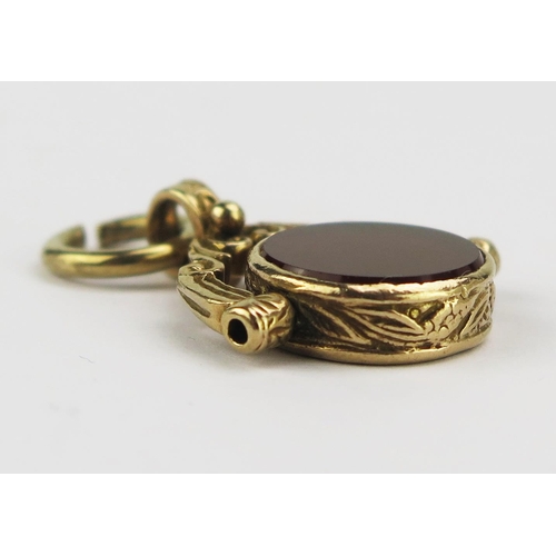 22 - A 9ct Gold, Bloodstone and Carnelian Swivel Fob, 21.16mm wide, hallmarked, 5.32g