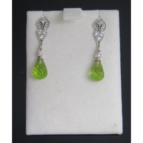 227 - A Pair of 18ct White Gold, Diamond and Peridot? Pendant Earrings, c. 28.9mm drop, 3.29g