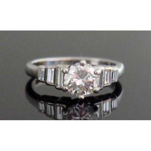 229 - A Deco 18ct White Gold and Diamond Ring, size K, hallmarked, 4.33g. Sold with IGI certificate statin... 