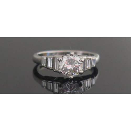 229 - A Deco 18ct White Gold and Diamond Ring, size K, hallmarked, 4.33g. Sold with IGI certificate statin... 