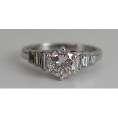 229 - A Deco 18ct White Gold and Diamond Ring, size K, hallmarked, 4.33g. Sold with IGI certificate statin... 