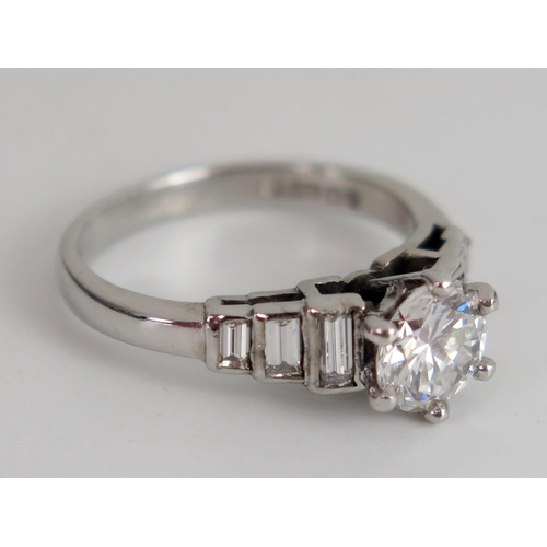 229 - A Deco 18ct White Gold and Diamond Ring, size K, hallmarked, 4.33g. Sold with IGI certificate statin... 