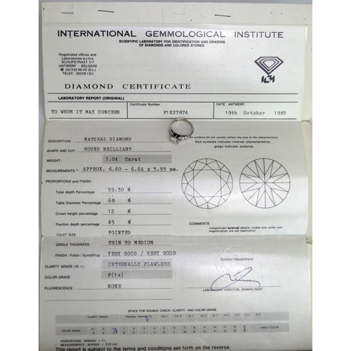 229 - A Deco 18ct White Gold and Diamond Ring, size K, hallmarked, 4.33g. Sold with IGI certificate statin... 