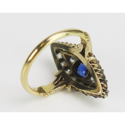 235 - An 18ct Gold, Sapphire and Old Cut Diamond Marquis Ring with a scrolling split shank, c. 5.7x4.8mm p... 