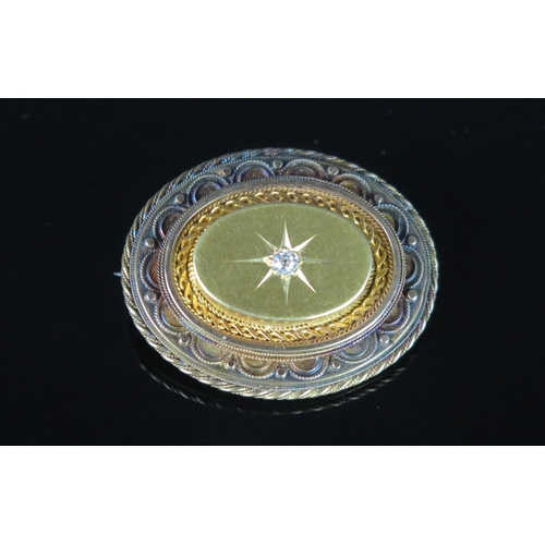 256 - A Victorian Precious Yellow Metal and Old Cut Diamond Locket Back Oval Brooch, set with a c. 2.7mm s... 