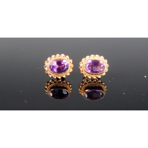 266 - A Pair of 9ct Gold and Amethyst Stud Earrings, c. 10.5x9mm, hallmarked, 1.61g