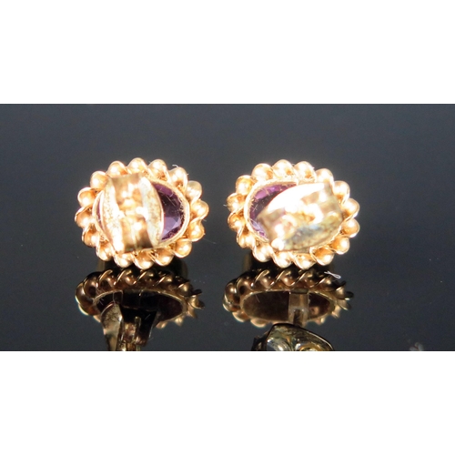 266 - A Pair of 9ct Gold and Amethyst Stud Earrings, c. 10.5x9mm, hallmarked, 1.61g