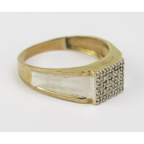 32 - A 9ct White and Yellow Gold and Diamond Ring, .12ct, stamped marks, size S.75, 2.75g