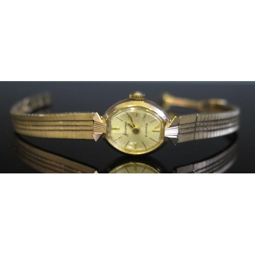 447 - An Accurist Ladies 9ct Gold Wristwatch on 9ct gold bracelet, 12g nett. Running