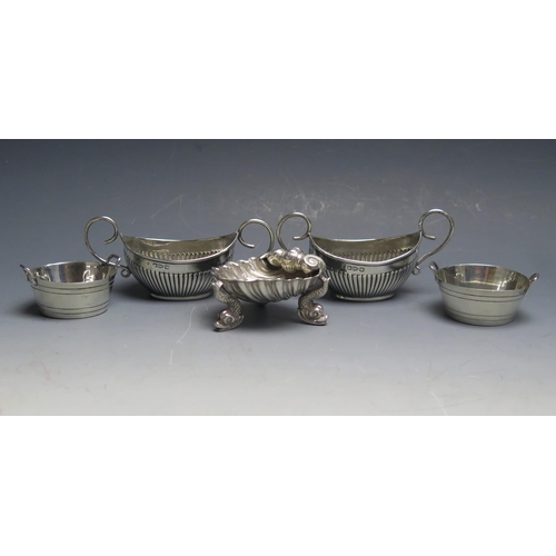 518 - A pair of Victorian silver salts, maker's mark worn, Chester, 1894, together with another pair of sa... 