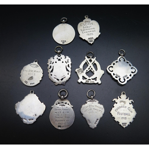 561 - Ten assorted silver fobs and medallions, various makers and dates, total weight of silver 93gms, 2.9... 