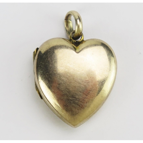 67 - An Antique Precious Yellow Metal Heart Shaped Locket, 24.5mm drop including suspension loop, KEE tes... 