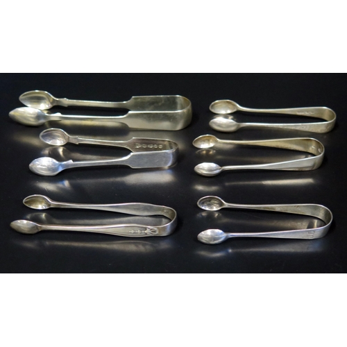 679 - Four assorted small silver pairs of sugar tongs, various makers and dates, together with two pair of... 