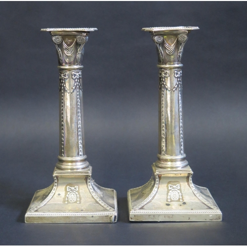 700 - A pair of Victorian silver candlesticks, maker Thomas Bradbury & Sons, London, 1896, with beaded noz... 