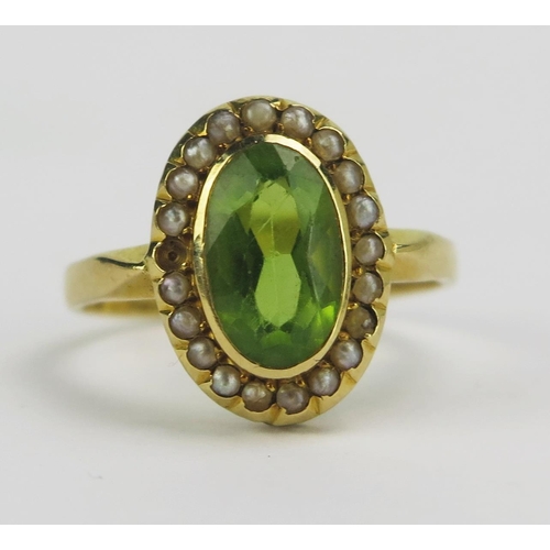 71 - An Antique 18ct Gold, Peridot and Pearl or Cultured Pearl Ring, 14.9x11mm head, rubbed 18CT mark, ma... 