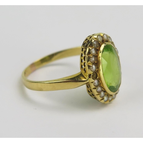 71 - An Antique 18ct Gold, Peridot and Pearl or Cultured Pearl Ring, 14.9x11mm head, rubbed 18CT mark, ma... 