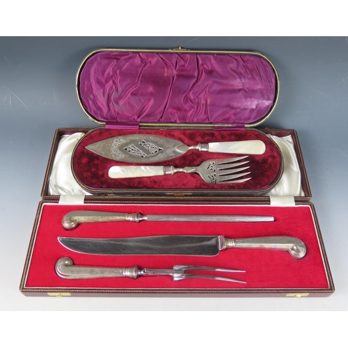 715 - A silver handled three-piece carving set, the knife, fork and steel with pistil grip handles, cased,... 