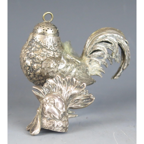 721 - A continental silver pepperette in the form of a cockerel, bears import marks, (one wing loose, the ... 