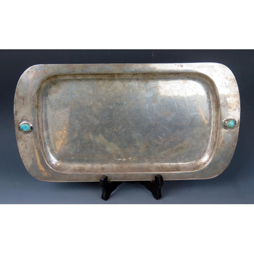 724 - A Liberty & Co 'Cymric' silver tray, Birmingham, 1904, of rectangular outline, with turquoise inset ... 