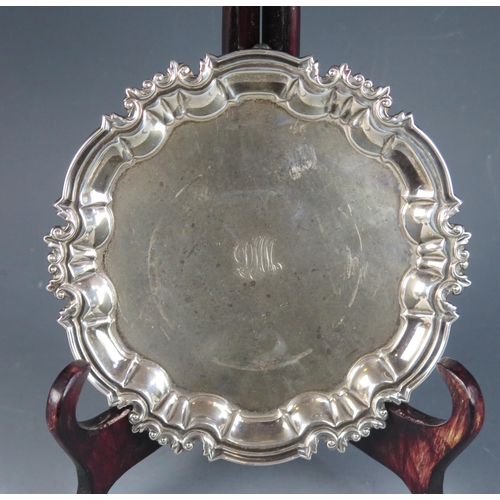 729 - A George V silver waiter, maker William Hutton & Sons Ltd, Sheffield, 1915, monogrammed, with moulde... 