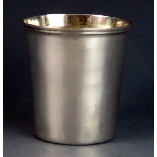 736 - A continental silver tumbler of cylindrical tapering form, unmarked, 7cm high, 42gms, 1.36ozs.