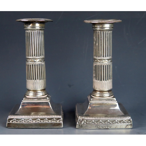 739 - A pair of Victorian silver candlesticks maker Henry Wilkinson & Co, London, 1886, with plain sconces... 