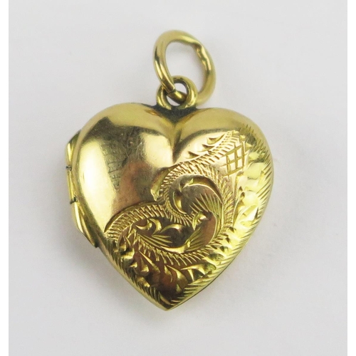 74 - A 9ct Gold Back and Front Heart Shaped Locket with chased scrolling decoration, 19mm drop, 1.86g