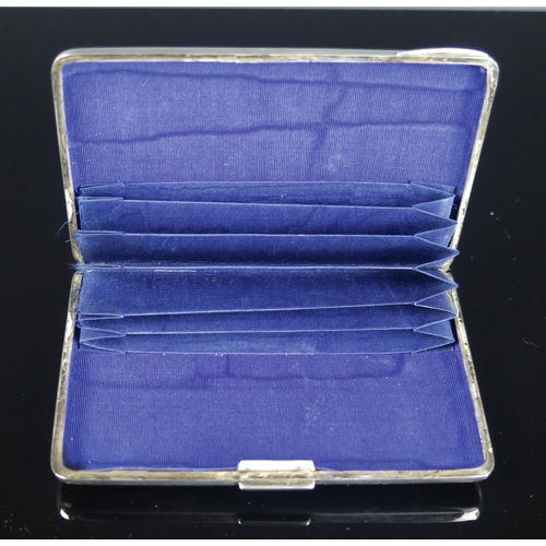 743 - A Victorian card case, maker George Unite, Birmingham, 1892, of rectangular outline, with chased fol... 