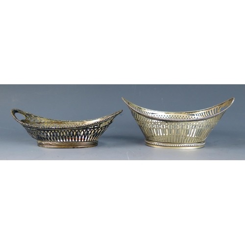 759 - Two  Dutch silver baskets, stamped marks, of navette-shaped outline with pierced sides, on oval base... 