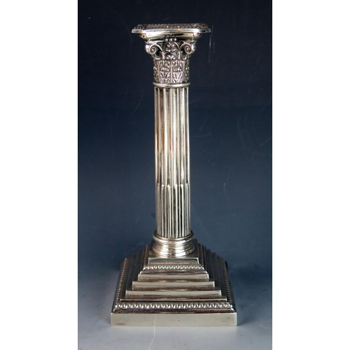 762 - An Elizabeth II silver Corinthian column candlestick, maker Walker & Hall, Sheffield, 1958, with sto... 