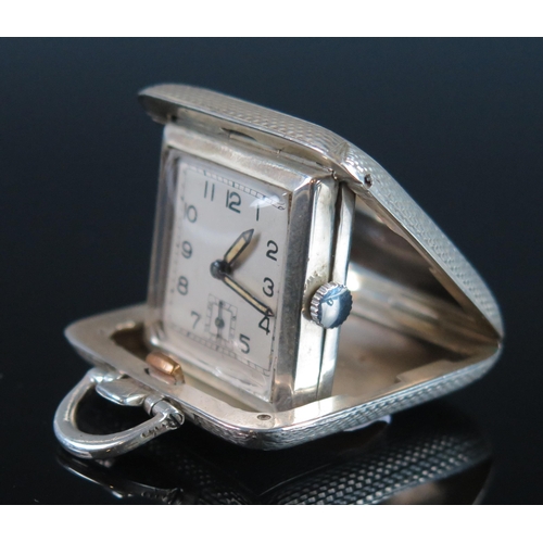 771 - A George V silver cased travelling timepiece, maker SSM, Birmingham, 1935, with 2.25cm Arabic dial w... 