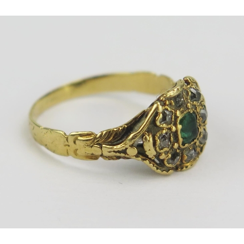 83 - An Early 19th Century Emerald and Diamond Cluster Ring with chased decoration to the shank, 9.6mm he... 