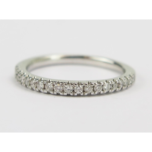 89 - A Platinum and Diamond Half Eternity Ring, stamped PT950 1KS 0.22, size N.5, 4.29g