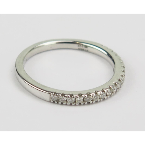 89 - A Platinum and Diamond Half Eternity Ring, stamped PT950 1KS 0.22, size N.5, 4.29g