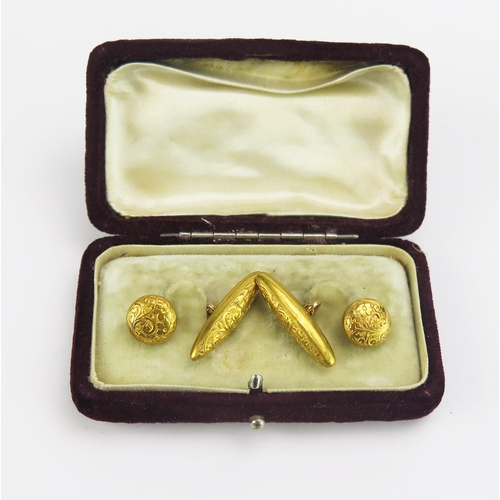 94 - A Pair of Victorian 15ct Gold Cufflinks with chased foliate decoration, Birmingham 1900, H.W.LD, cas... 