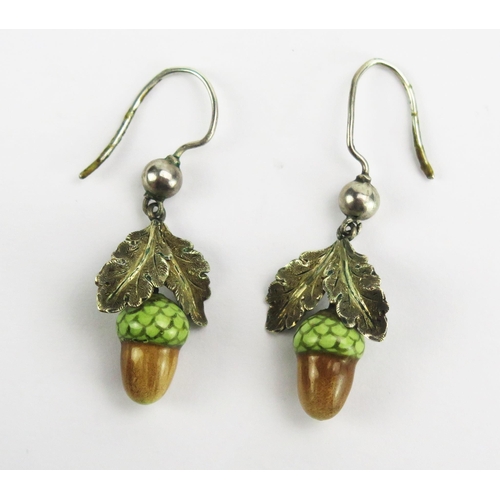 98 - A Pair of Antique Enamel Acorn Pendant Earring in a precious white metal mount with chased decoratio... 