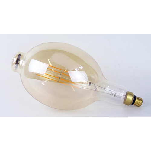 1077A - A large decorative electric light bulb, with screw fitment, 39cm high.