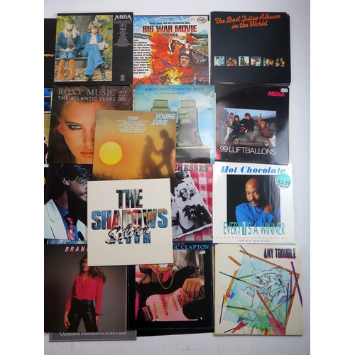 1123C - A collection of 45 and 33rpm LP's, artists include, Abba, Roxy Music, Neil Diamond, Eric Clapton, OM... 