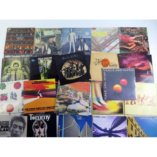 1125 - A collection of mainly 1970's LP records including Prog Rock, and pop, artists include Led Zeppelin,... 