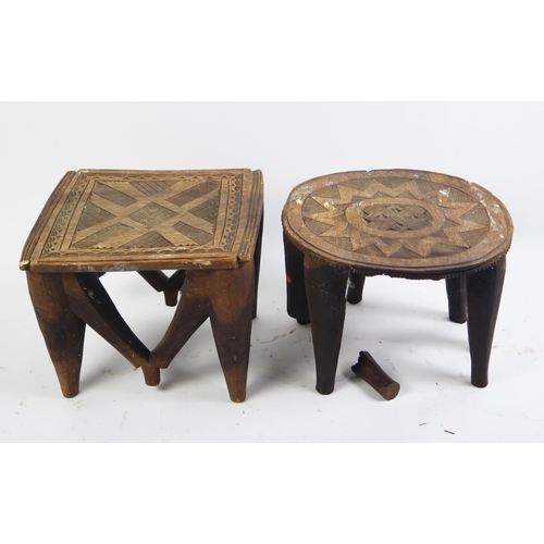 1168 - A Nupe tribe carved wood stool, with geometric pattern decoration to the seat, 29cm high, 36cm wide,... 