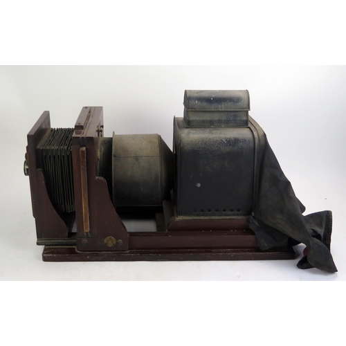 1182 - Hunter Penrose Ltd, a mahogany and brass mounted enlarger or process camera for converting photograp... 