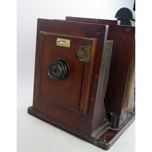 1182 - Hunter Penrose Ltd, a mahogany and brass mounted enlarger or process camera for converting photograp... 