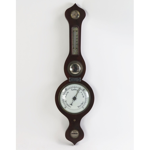 1199 - A Victorian mahogany onion topped wheel barometer, fitted with hygrometer, mercurial thermometer, co... 