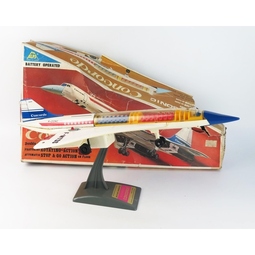 1360C - Alps (Japan) Battery Operated Supersonic Concorde, tinplate and plastic with stand - excellent (unte... 