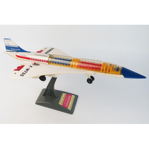 1360C - Alps (Japan) Battery Operated Supersonic Concorde, tinplate and plastic with stand - excellent (unte... 