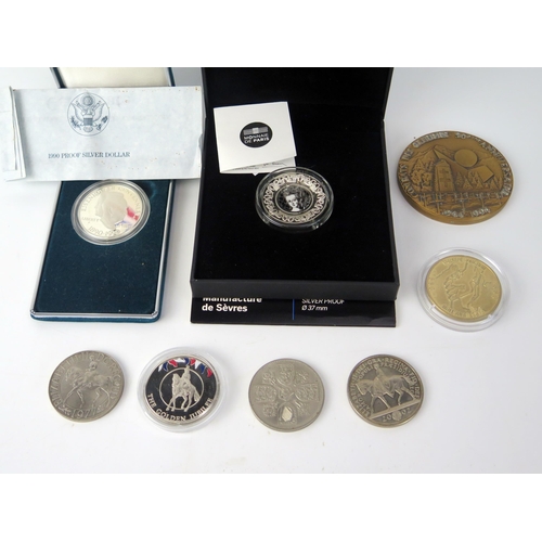 1440A - A 10 Euro proof coin, a 1990 American proof silver dollar, commemorative crowns. and medallions.