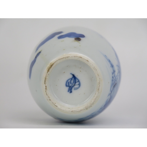 1534 - A Chinese blue and white porcelain ovoid vase with rock and fauna decoration, 11cm high.