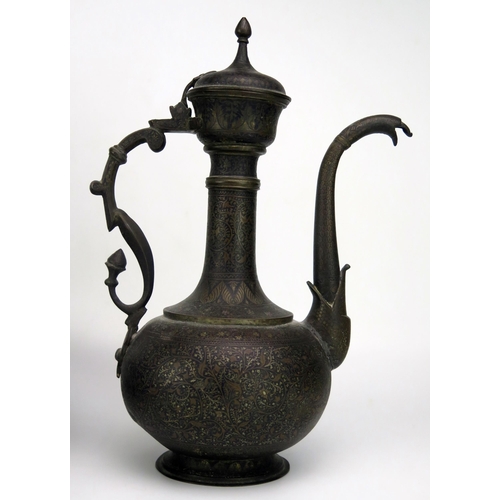 1539 - An Indo-Persian niello decorated coffee pot of traditional design 32cm high together with a metal bo... 