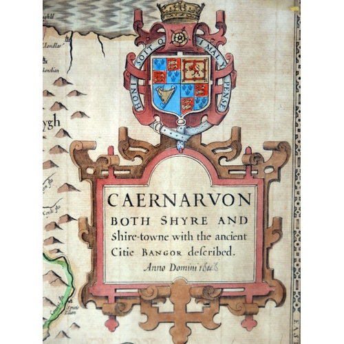 1610B - After John Speede, a hand coloured engraved map of Caernarvon, with vignettes of Caernarvon and Bang... 