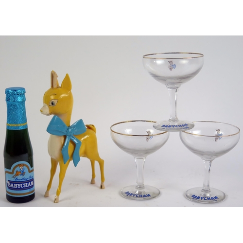 1631 - Babycham a 100ml bottle, three Babycham champagne glasses, and plastic advertising Babycham deer. (5... 